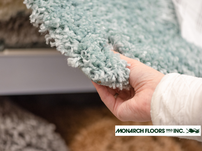 Woman cleaning carpet in a bright room, Monarch Floors, Monarch Floors Edmonton, Monarch Floors Canada, Monarch Floors Near Me, Monarch Floors 1953 Inc, carpet store, carpet store near me, the carpet store, carpet store calgary, carpet store near, carpet